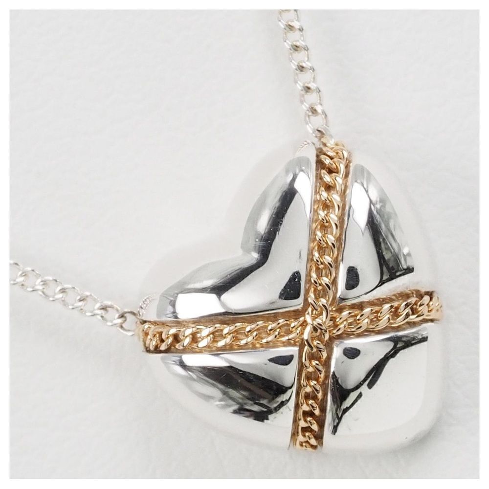 Tiffany & Co. “Cross My Heart” Sterling Silver & 18K Gold Heart Necklace